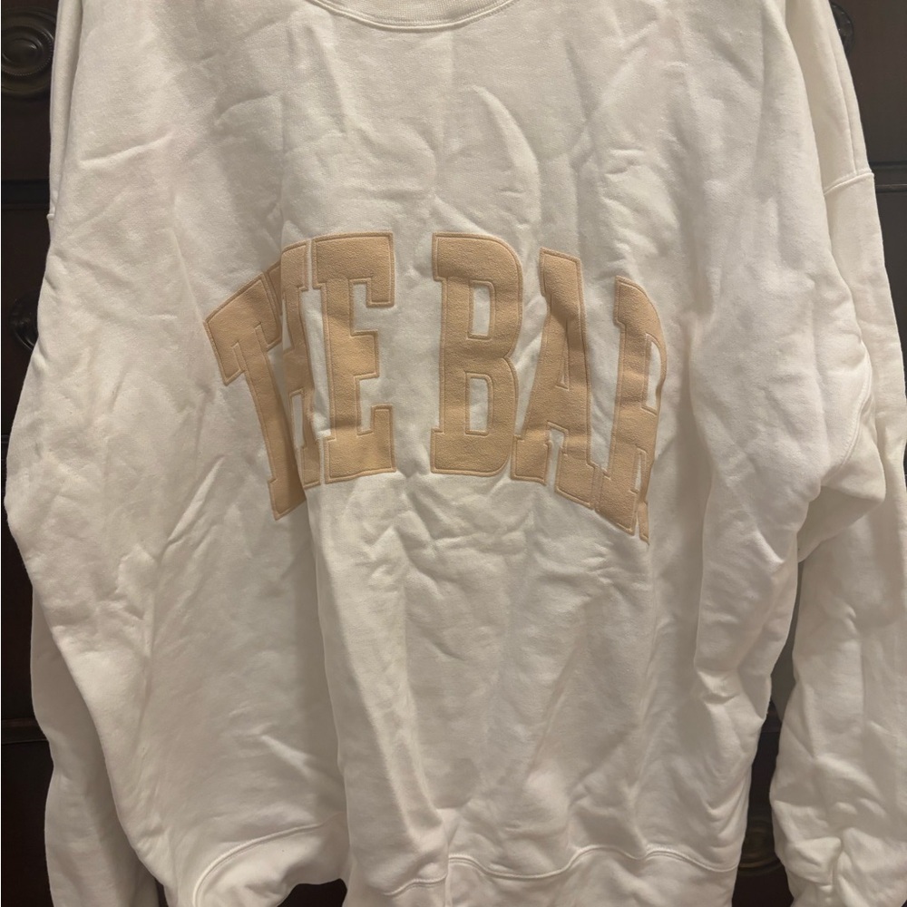 White and Tan Woman’s Sweatshirt